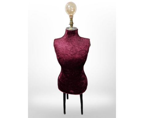A mannequin standard lamp, height 126cm.