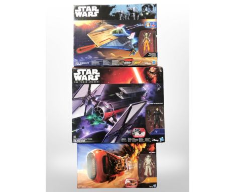 Three Hasbro Disney Star Wars figurines, Rey's Speeder (Jakku), Hera Syndulla's A-Wing, Tie Fighter, boxed.