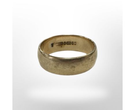 A 9ct yellow gold band ring, size R. CONDITION REPORT: 5.3g.