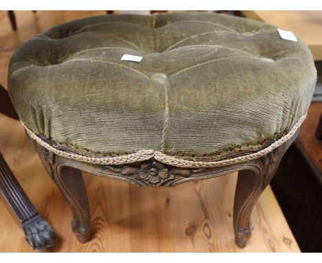 An oval footstool, button fabric upholstered top