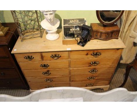 A pine double width chest of drawers, 91cm x 125cm