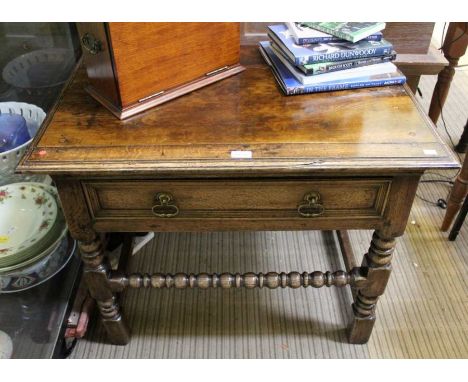 A part 19th century oak side table turned and blocked legs with single drawer, bobbin turned stretcher, 67cm x 85cm&nbsp;