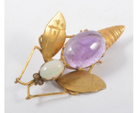 A gemset bug brooch, set with an oval cabochon cut opal and amethyst in a yellow metal mount, 50cm long. 