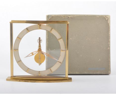 A lacquered brass inline mantel clock, No. 320, 16cm, in a Jaeger LeCoultre box.