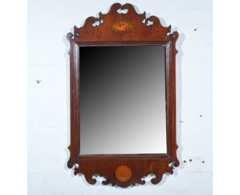 Edwardian mahogany wall mirror, Chippendale style, inlaid ovals, rectangular plate, 88cm, 53cm.