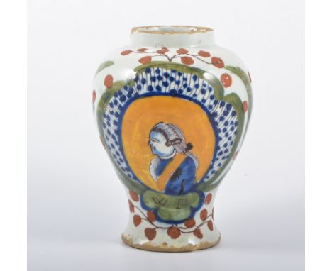 A Delft vase-shaped jar, painted with a profile portrait WF, 15cm.