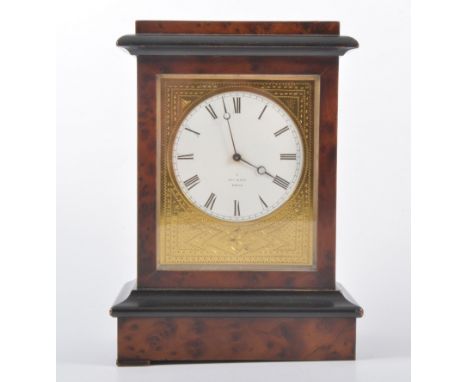 Two mantel clocks, a mahogany cased three train Napoleon style clock with Arabic dial, Westminster chime, 45cm wide, a birds 