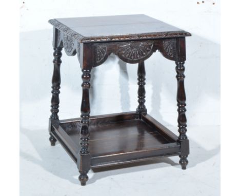 Victorian oak occasional table, square top with carved and moulded edge, lunette, frieze, turned legs joined by a shelf, 54cm