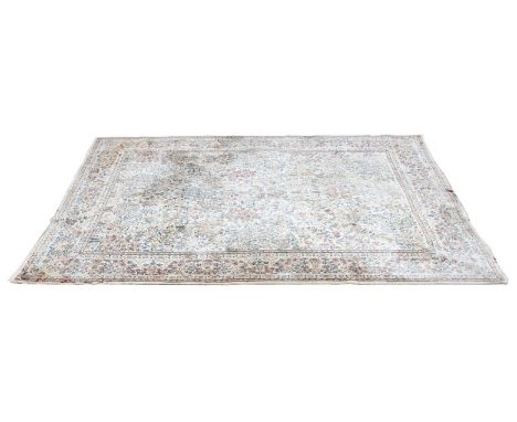 Kirman small carpet, decoration with stylised trees and flowers with meandering borders, 370cm x 273cm.
