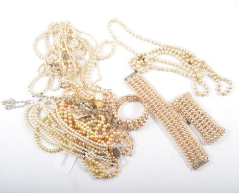 A collection of pearl jewellery, two cultured pearl necklaces, a single row and a double row, both graduated pearls, various 