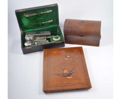 Morocco bound travelling case, containing some silver mounted fitments, matched and damaged, the case 27cm; olive wood bound 