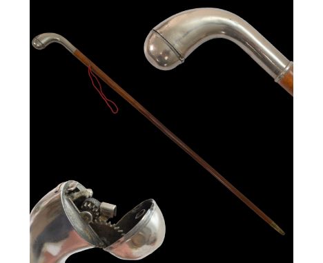 A rare Golfclub Walking Stick Cane with lighter, early 20th century. Wood shaft with a silver handle containing lighter. A wo