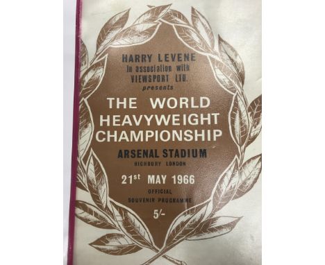 A official program Muhammad ALi v Henry cooper with ticket.