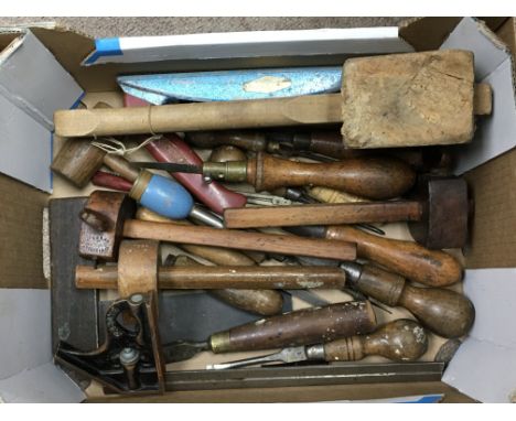 A small box of mixed woodworking tools.