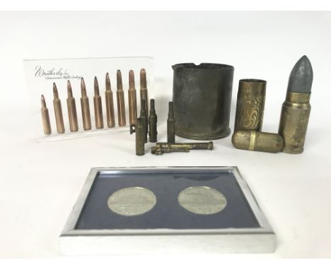 Bullet shells including a Weatherby inc acrylic display, Tilbury docks coins and a brass lighter