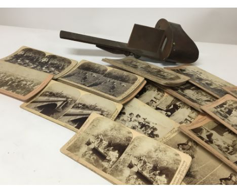 A Victorian 3D viewer with a large quantity of cards from around the world a Mahogany ships light morse code box and an oak m