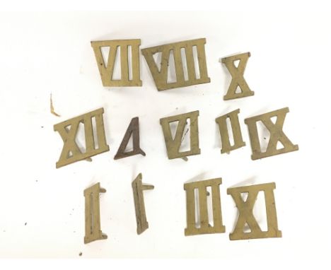 Cast Metal Roman numerals possibly to be from a clock, Made in London.