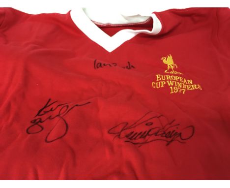 A Liverpool football shirt signed Kenny Dalglish , Ian Rush , Kevin Keggan .