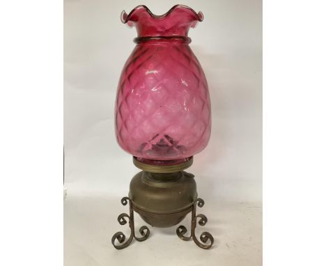 Large oil lamp with cranberry tinted shade