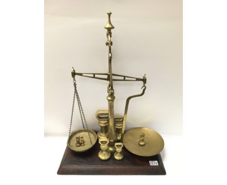 A large Victorian W.Parry &amp; Co. brass scale and weights. 70cm.