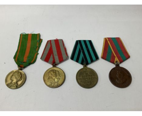 4 medals, Russian labour award 1941, 30 Years Soviet army, French Survivors medal plus additional medal.