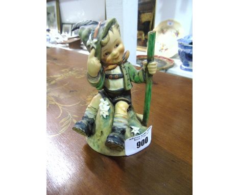 A Goebel Figure of a Young Boy.