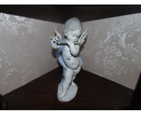 A Lladro  Figure of a Cherub Playing a Flute