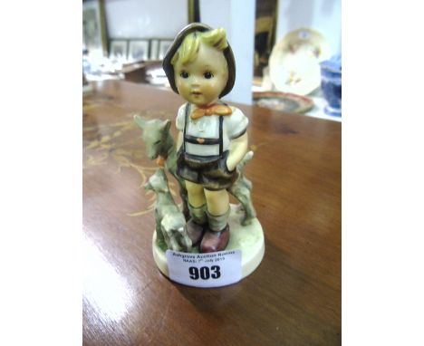 A Goebel Figure of a Boy with Sheep.