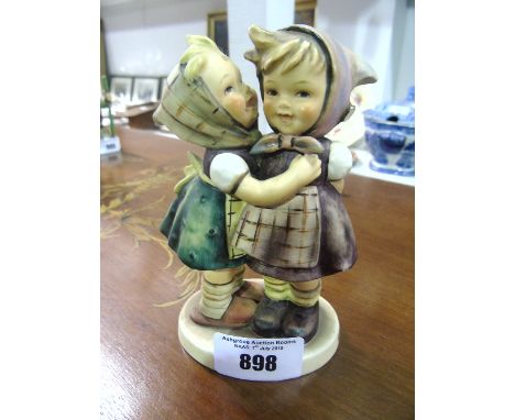 A Goebel Figure of Two Girls 'Telling Her Secret'.