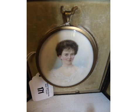 An Oval Miniature Portrait - Helen Wright (nee Kerr) contained in a leather folding case. 8cm x 6.5cm.