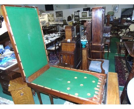 A Victorian Mahogany Cased Bagatelle Board, without balls.