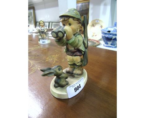 A Goebel Figure of a Boy Hunting.