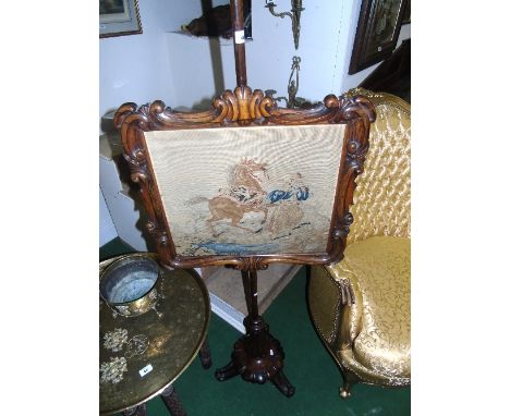 A 19th Century Rosewood Pole Screen, with rectangular tapestry panel depicting an Arab horse and rider mounted within a deep 