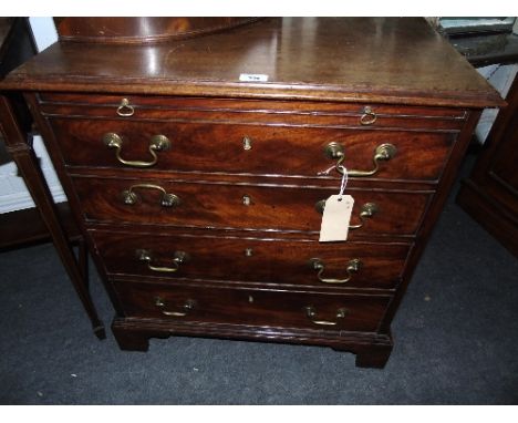 A Georgian Mahogany Commode with four drawer false front