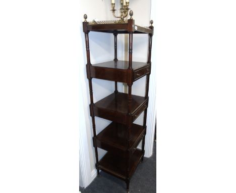 A Four Tiered Mahogany and Veneer Occasional Stand. Decorative bronze fringing on top and bottom.