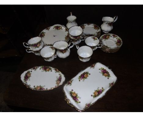 A Collection of Royal Albert Old Country Roses Pattern Tea Wares comprising three milk jugs, a sugar bowl, pair of cake plate