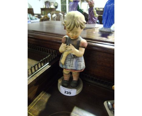 A Goebel Figure of a Young Girl.