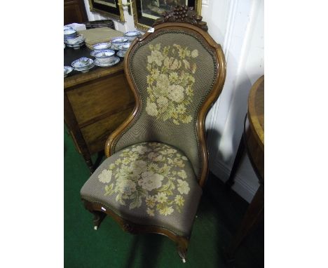 A Beautiful 19th Century Mahogany Highly Carved Salon Chair with origional tapestry seat and back. Circa 1850.