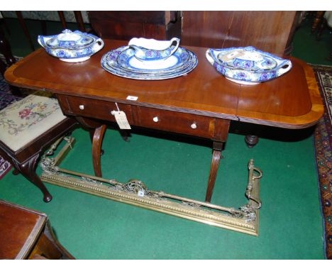 A Mahogany Sofa Table of Neat Proportions, fitted two short drawers, the 'X' shaped supports joined by a stretcher rail. 130c