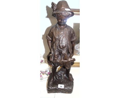 A Large Bronze Depicting A Child And A Hare.Inscribed bottom right.