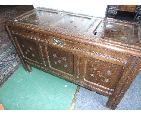 Late 17th Early 18th Century Oak Coffer, having a triple panel top, each panel with carved roundels, triple panel front with 