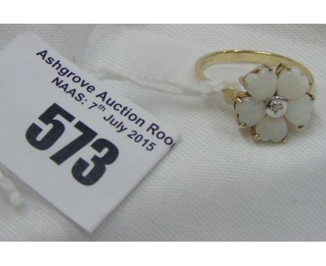 A Gold Diamond and Opal Cluster Ring.