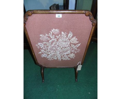 A 20th Century Walnut Firescreen.
