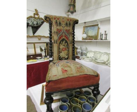 A Victorian nursing chair with tapestry seat and back