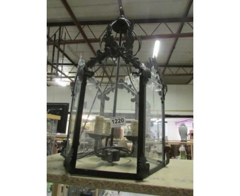 A metal and glass lantern