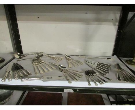 A set of silver plated cutlery including ladle