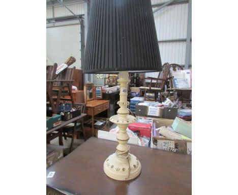 A painted table lamp with shade