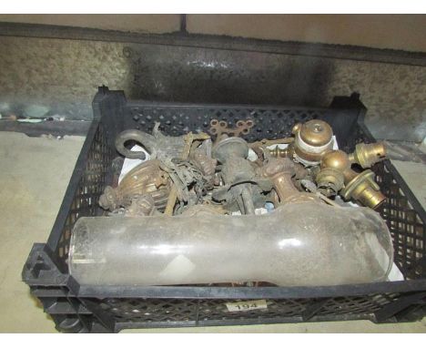 A box of brass lamp parts etc