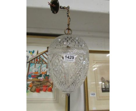 A cut glass acorn pendant light
Condition
Top bowl has a small crack approximately 10mm long from the hole for top fitting ho