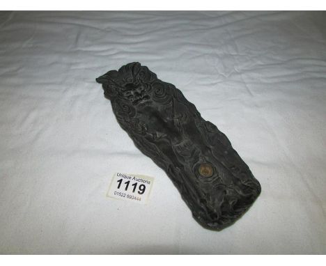A 19th century bronzed spelter pen tray depicting the devil and incorporating a compass